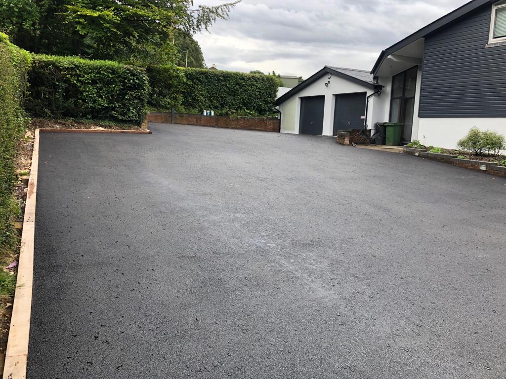 This is a photo of a asphalt driveway which is in the process of being installed by Lithgow Road Tek