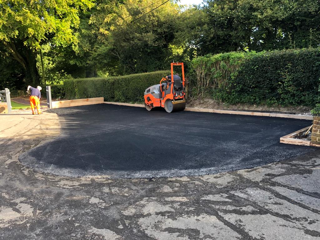 This is a photo of a bitumen driveway which is in the process of being installed by Lithgow Road Tek